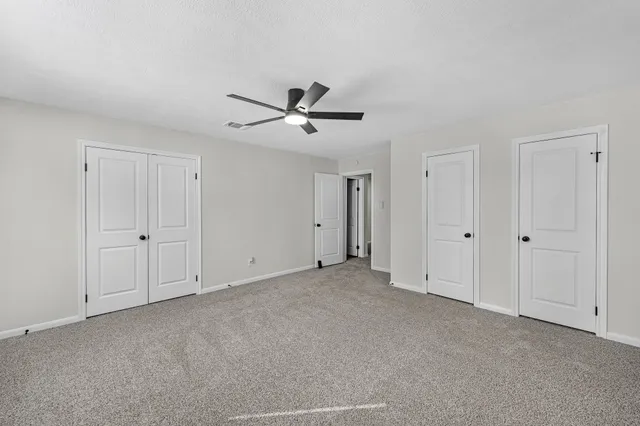 a bathroom with a shower and a bath tub