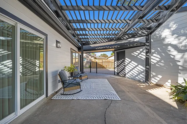 a view of porch with seating space