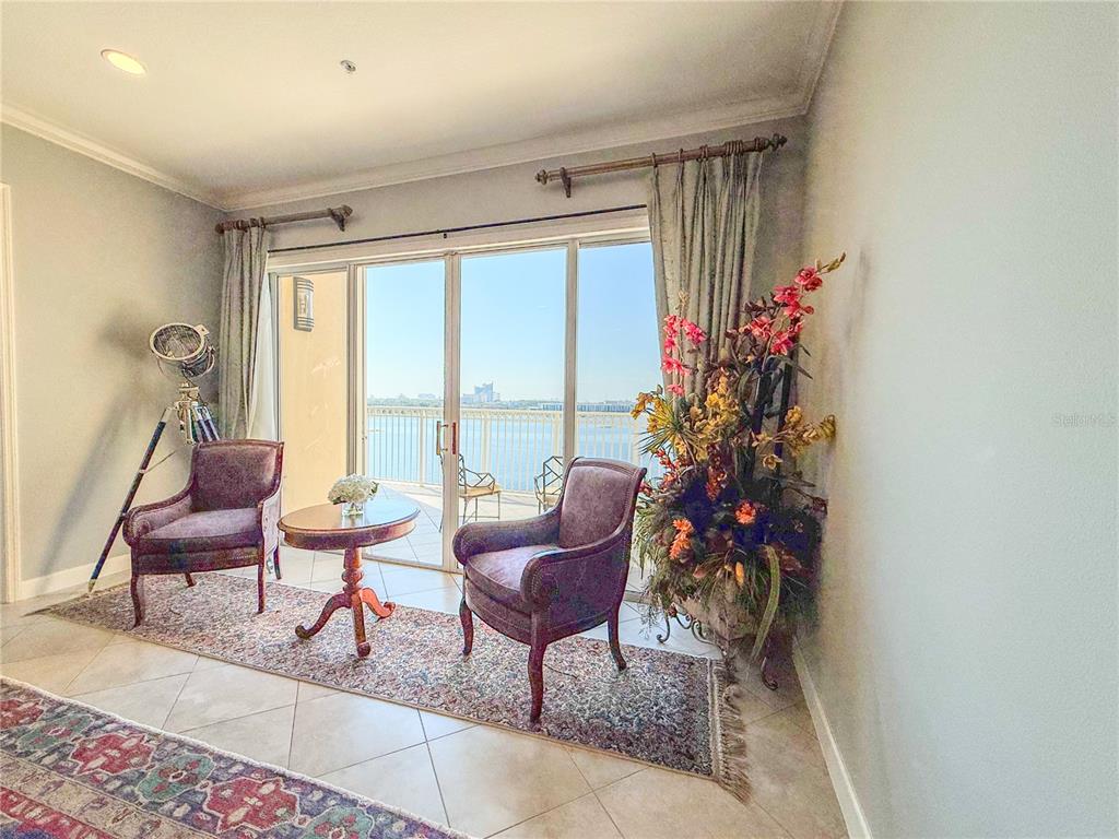 8755 The Esplanade, Unit 130 Orlando, FL 32836 - Photo 29 of 71 a living room with furniture and a potted plant