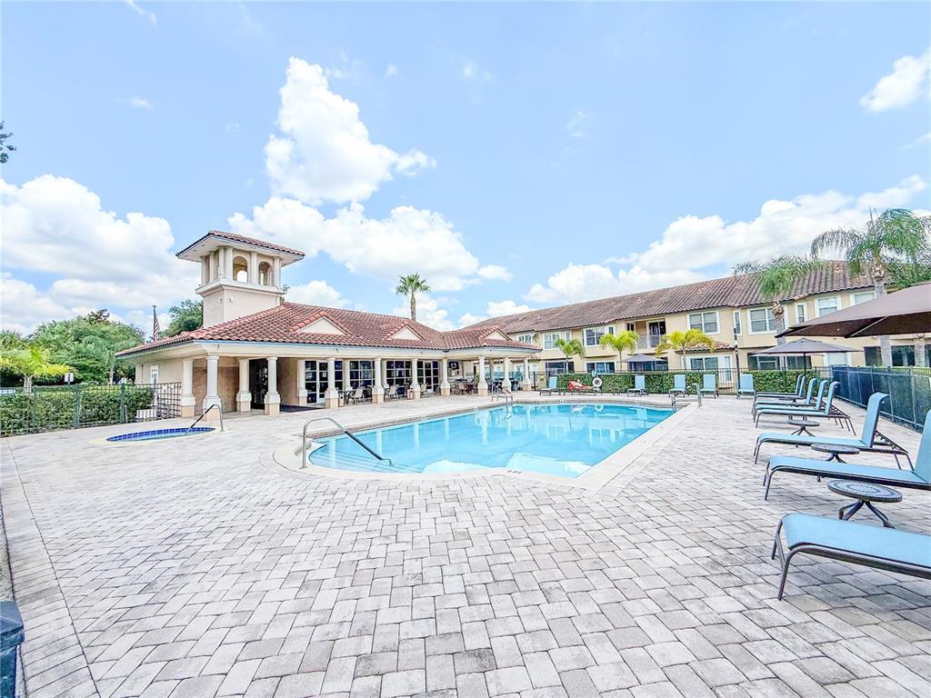8755 The Esplanade, Unit 130 Orlando, FL 32836 - Photo 66 of 71 a view of a house with swimming pool