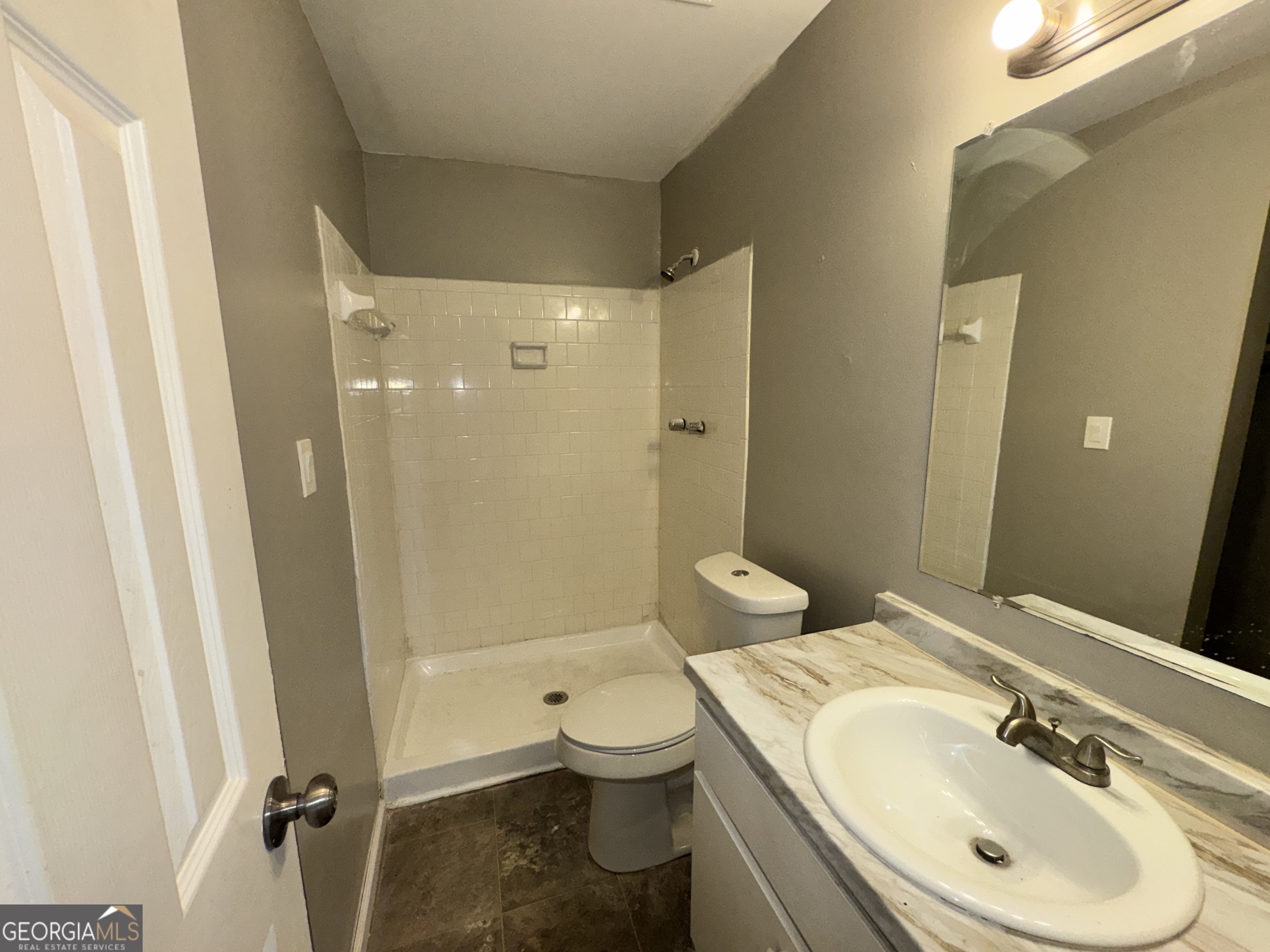 3575 Oakvale Road, Unit 911 Decatur, GA 30034 - Photo 10 of 10 a bathroom with a sink a toilet and shower