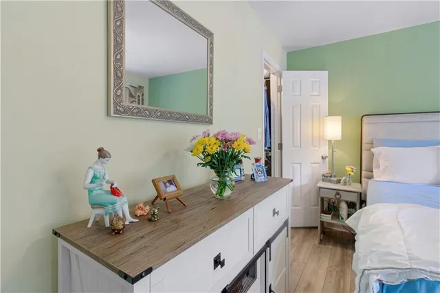 a dining room with furniture and wooden floor