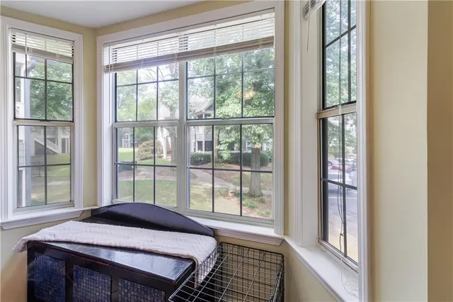 a room that has a bed and a window