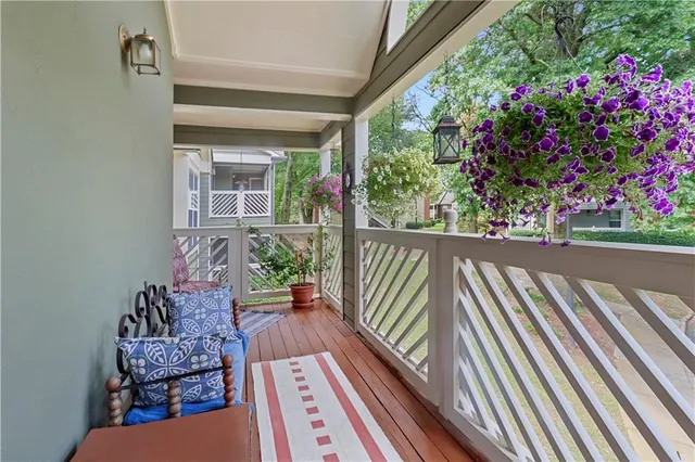 a view of two chairs in balcony