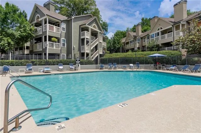 a view of a house with a swimming pool