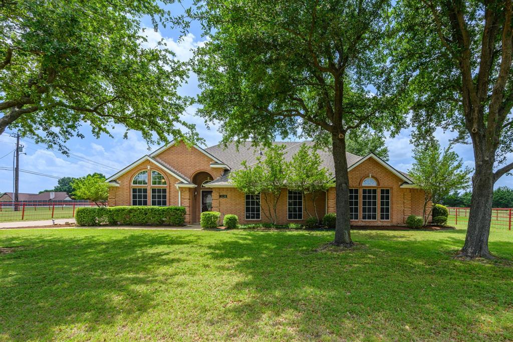 9624 Wells Road Wylie, TX 75098 - Photo 1 of 25 a front view of house with yard and green space