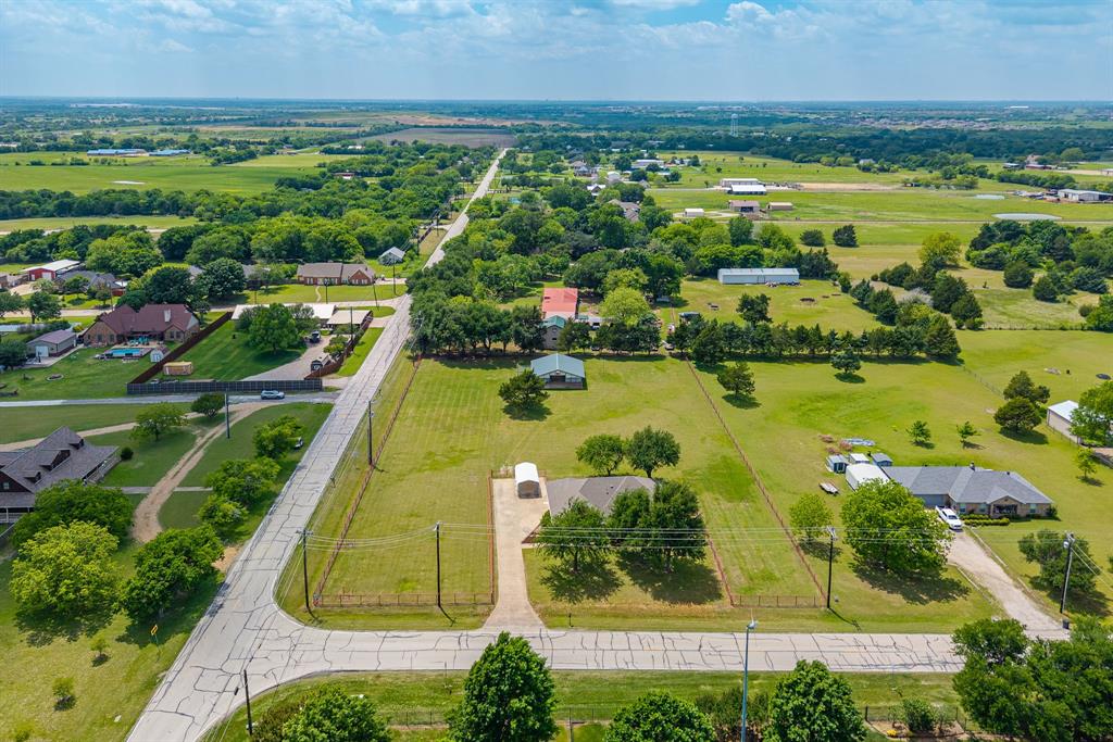 9624 Wells Road Wylie, TX 75098 - Photo 22 of 25 an aerial view of ocean with residential house swimming pool and outdoor space