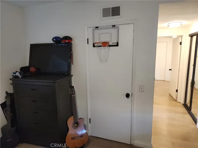 a kitchen with a sink a stove and cabinets