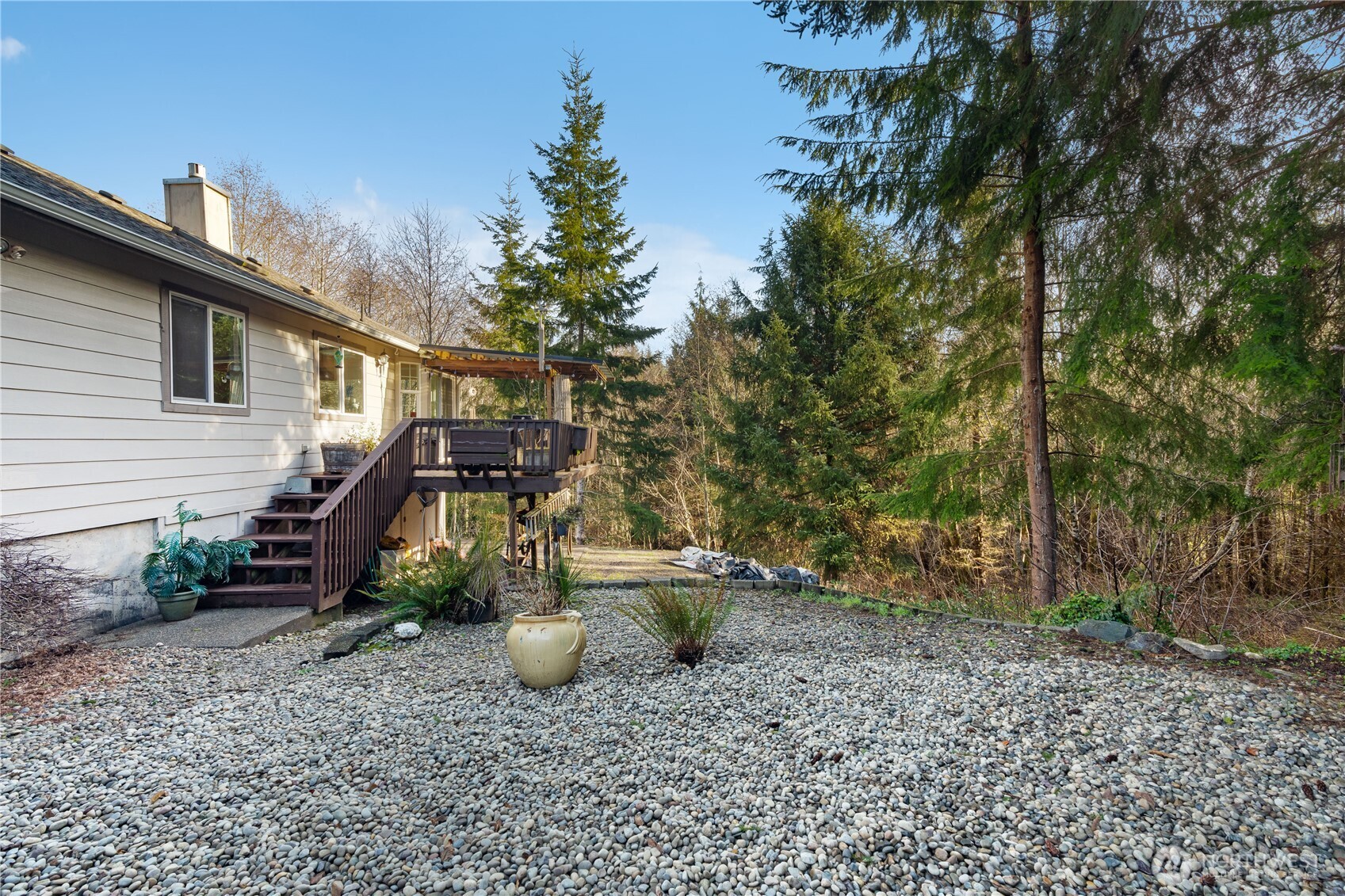 405 Andrews Avenue Cosmopolis, WA 98537 - Photo 27 of 34 a view of a chair and tables in the backyard
