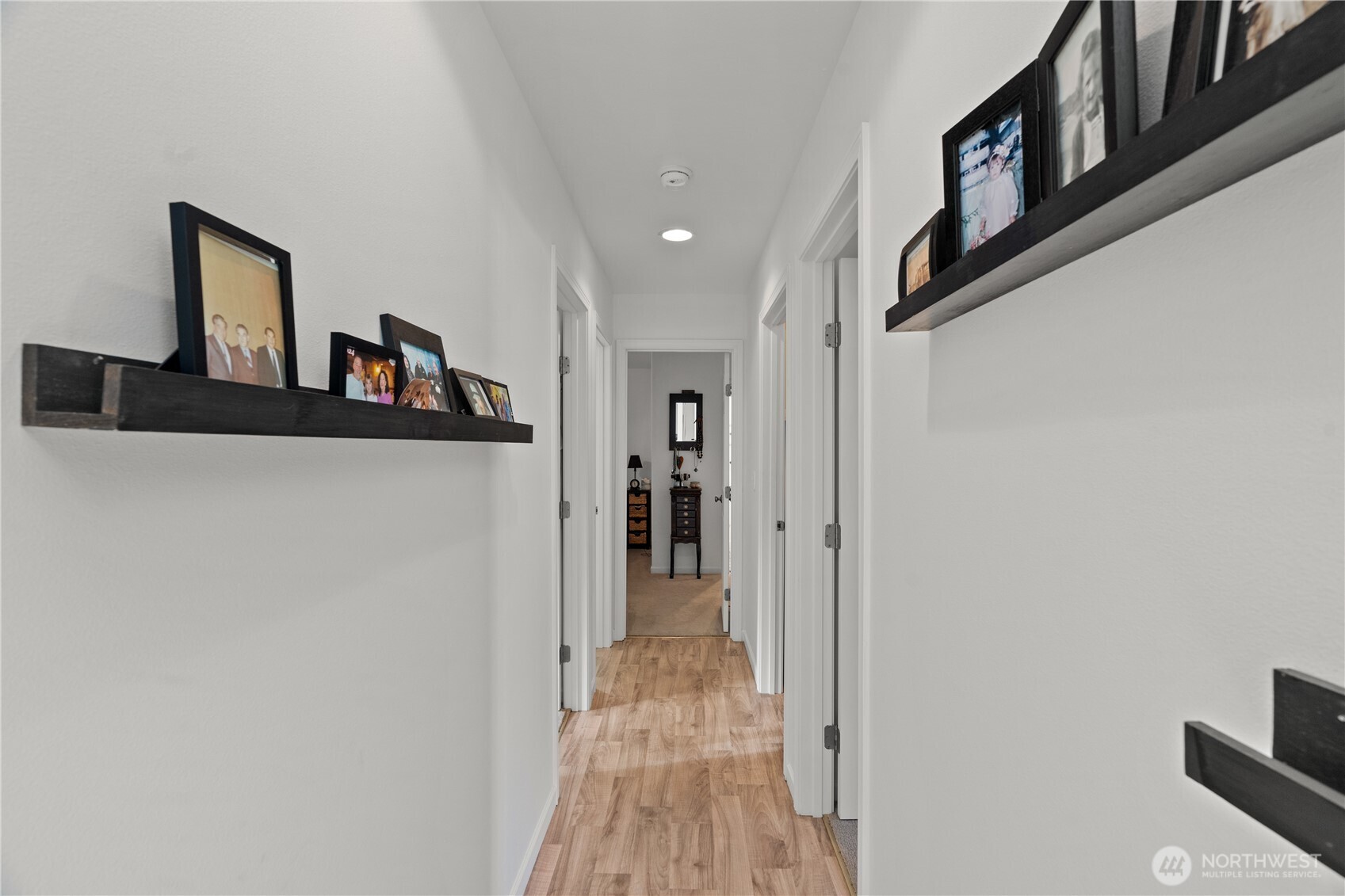 405 Andrews Avenue Cosmopolis, WA 98537 - Photo 10 of 34 a view of a hallway view with wooden floor and staircase