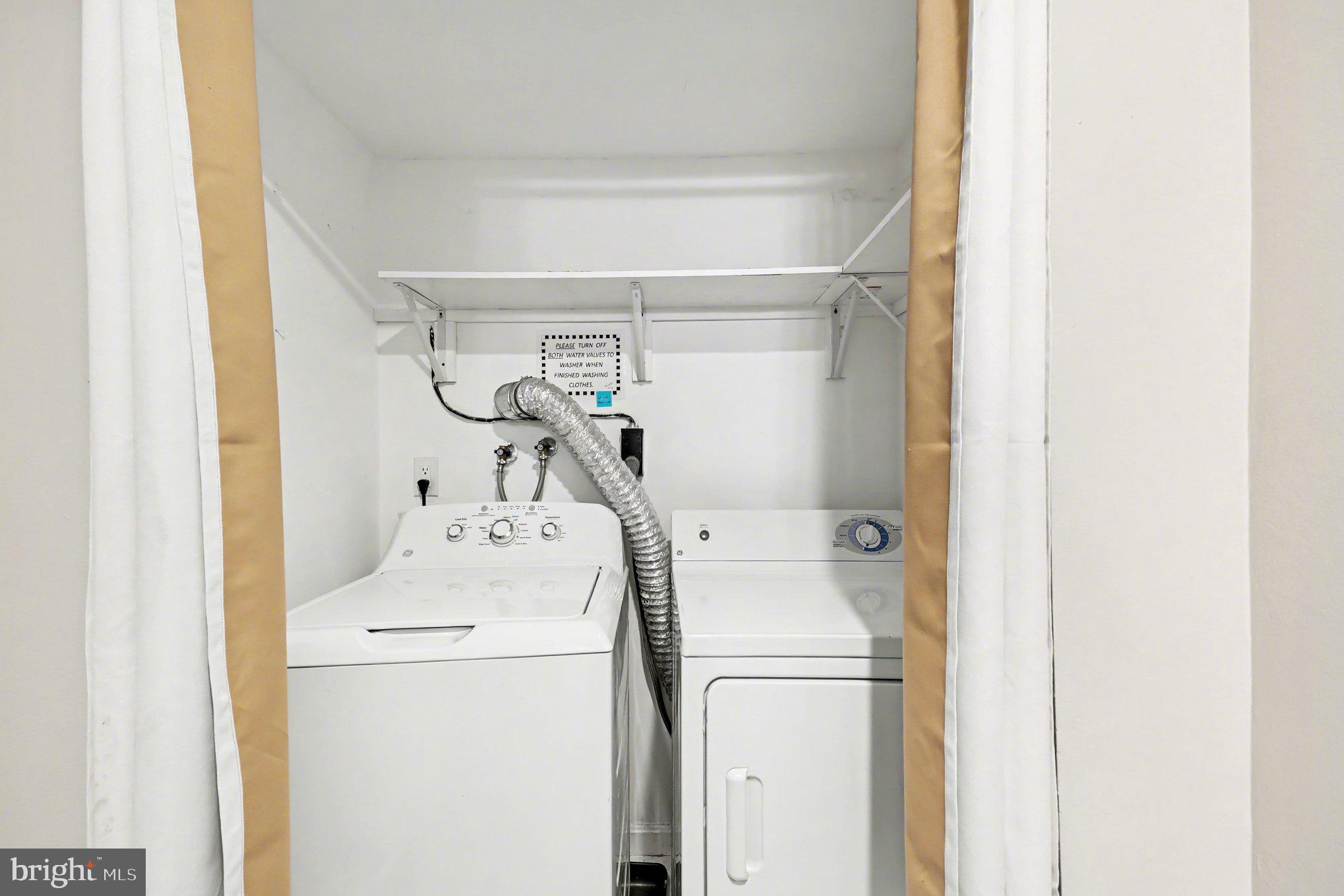 6141 Edsall Road, Unit L Alexandria, VA 22304 - Photo 11 of 18 a utility room with dryer and washer