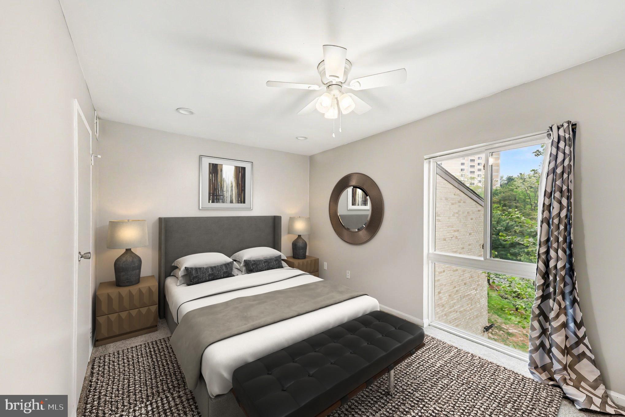 6141 Edsall Road, Unit L Alexandria, VA 22304 - Photo 8 of 18 a bedroom with a large bed and a window