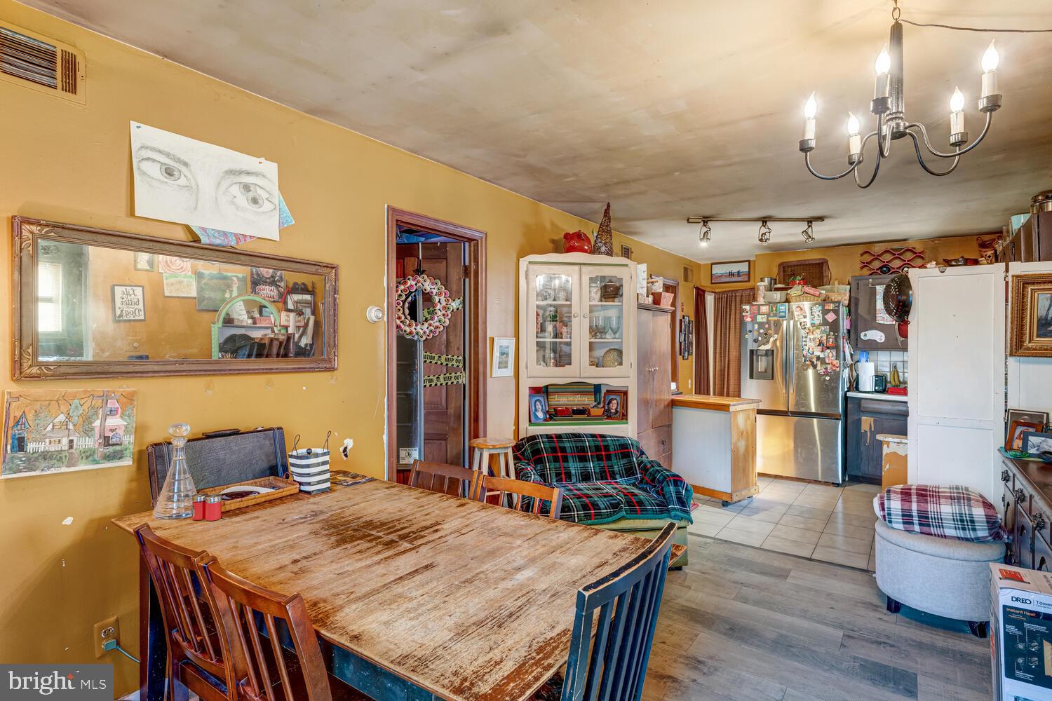 886 Radio Road Little Egg Harbor, NJ 08087 - Photo 12 of 22 a view of a dining room with furniture and chandelier
