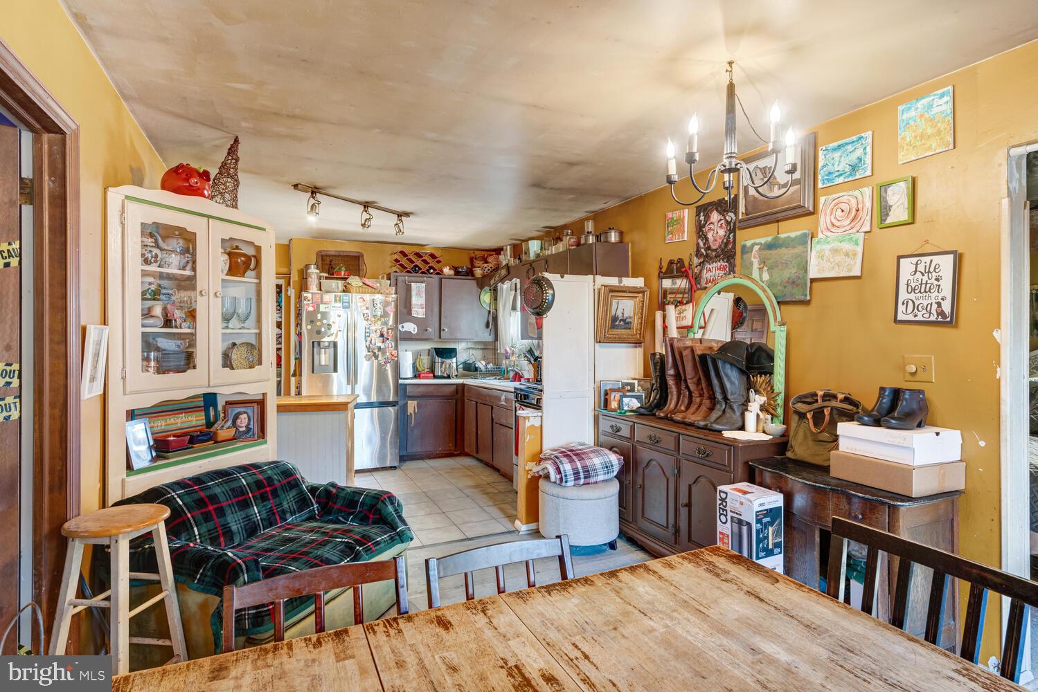 886 Radio Road Little Egg Harbor, NJ 08087 - Photo 13 of 22 a living room with lots of furniture and a book shelf