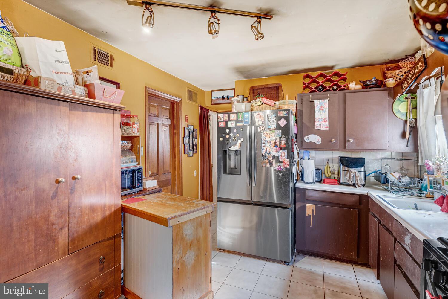 886 Radio Road Little Egg Harbor, NJ 08087 - Photo 16 of 22 a kitchen with stainless steel appliances granite countertop a refrigerator and a stove