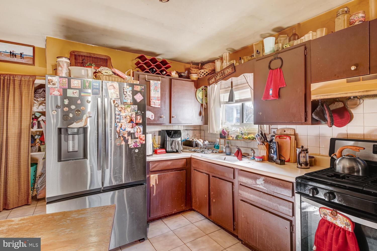 886 Radio Road Little Egg Harbor, NJ 08087 - Photo 17 of 22 a kitchen with stainless steel appliances granite countertop a refrigerator and a sink