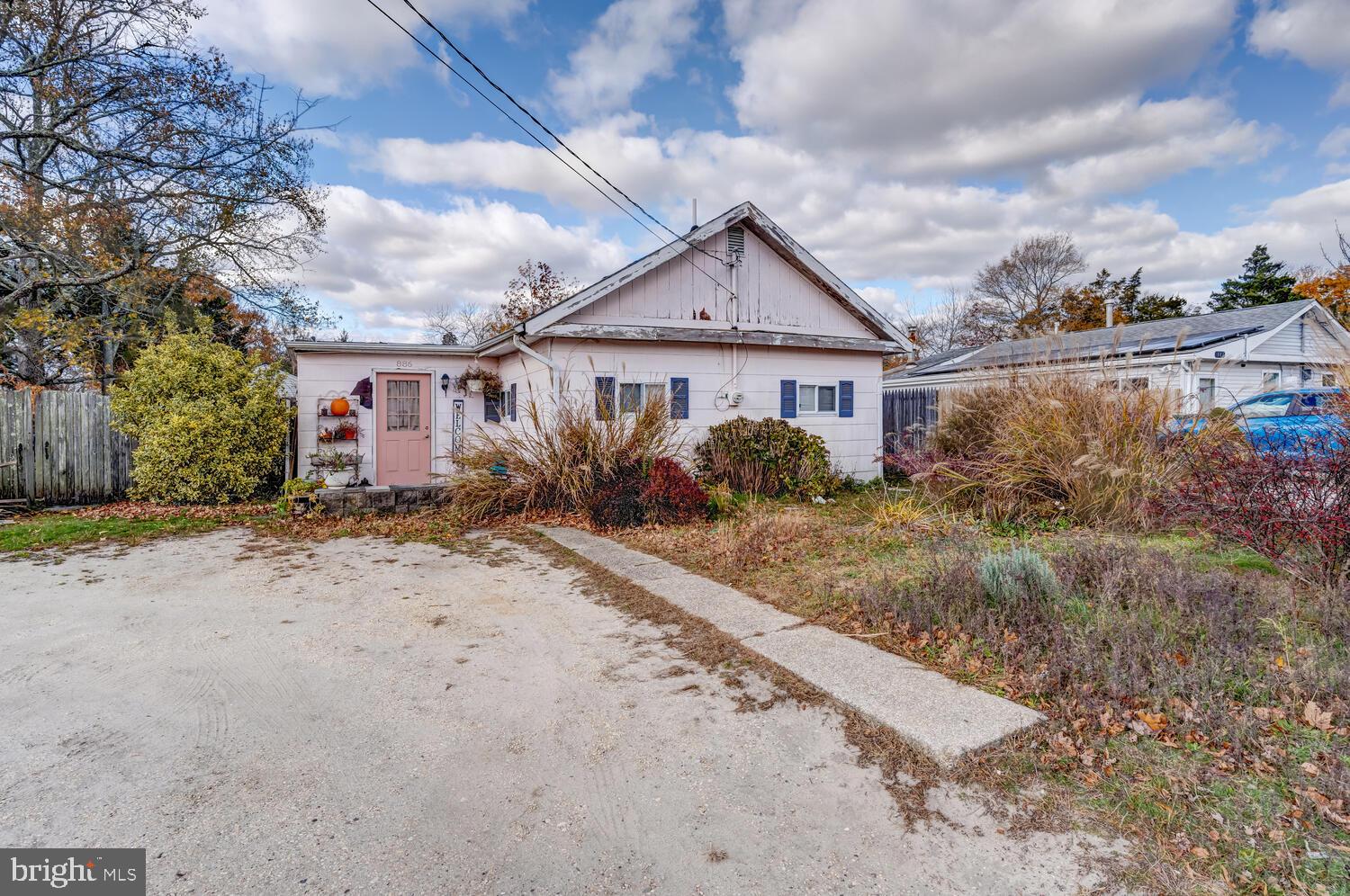 886 Radio Road Little Egg Harbor, NJ 08087 - Photo 2 of 22 a view of a yard in front of a house
