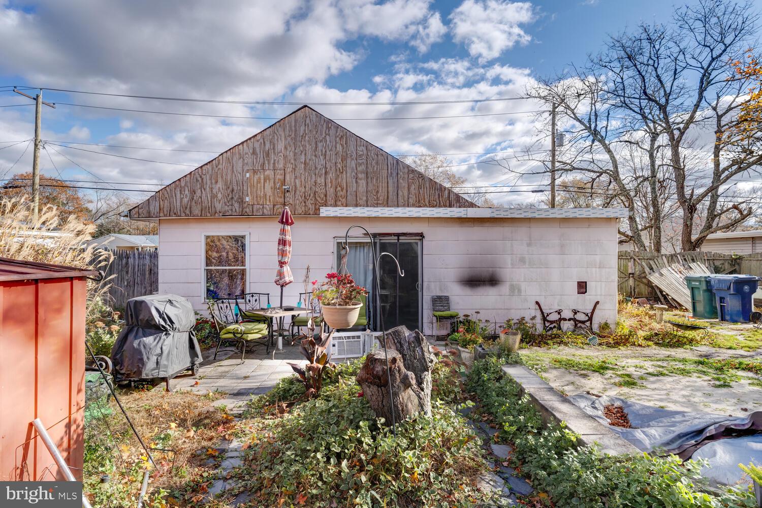 886 Radio Road Little Egg Harbor, NJ 08087 - Photo 5 of 22 a view of a house with yard and sitting area