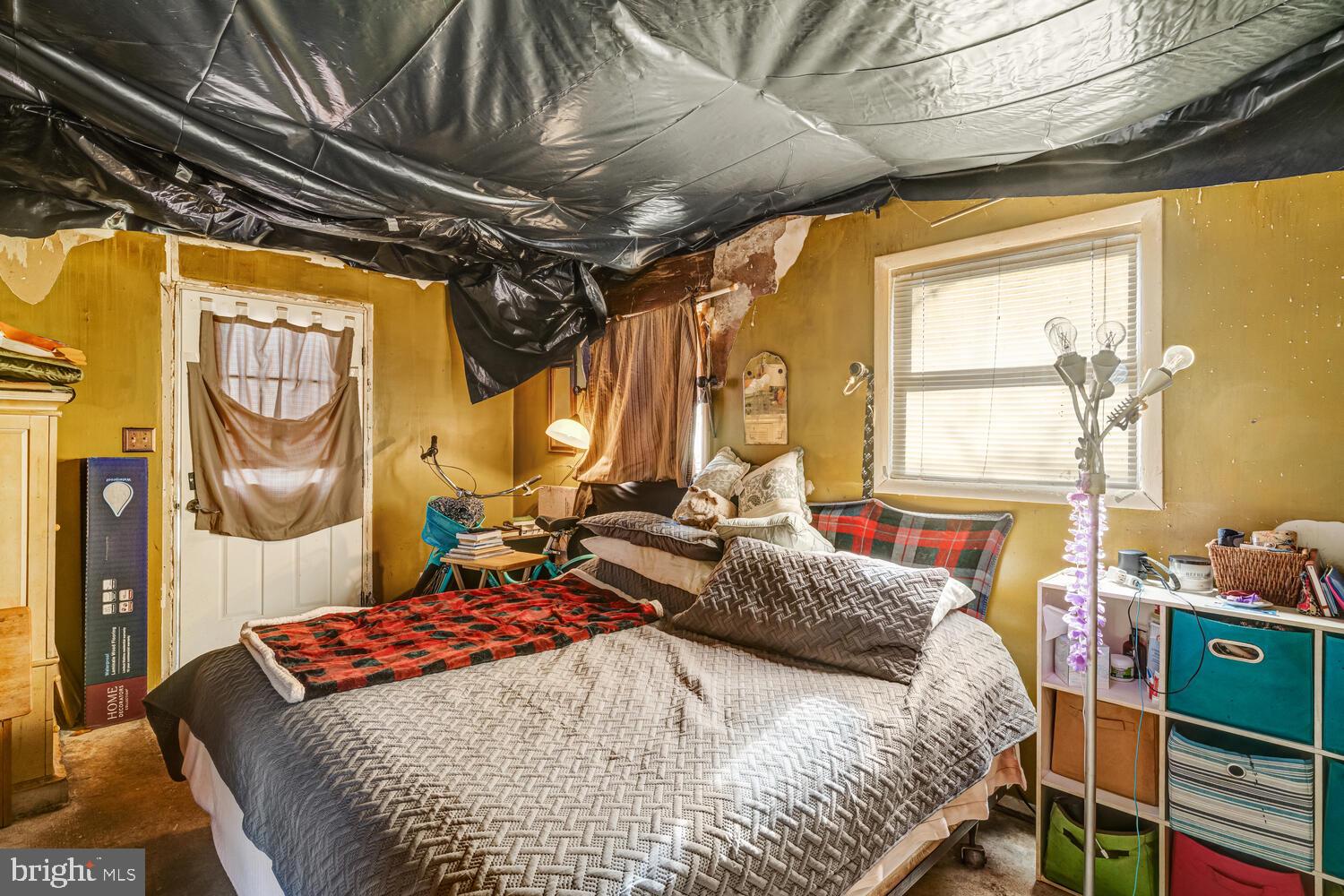 886 Radio Road Little Egg Harbor, NJ 08087 - Photo 9 of 22 a bedroom with a bed and wooden floor