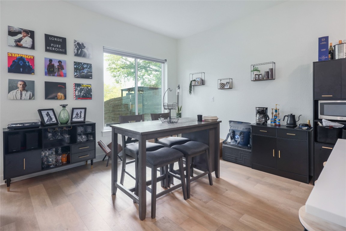 5820 Sutherlin Road, Unit 17 Austin, TX 78723 - Photo 3 of 15 a view of a dining room with furniture window and outside view