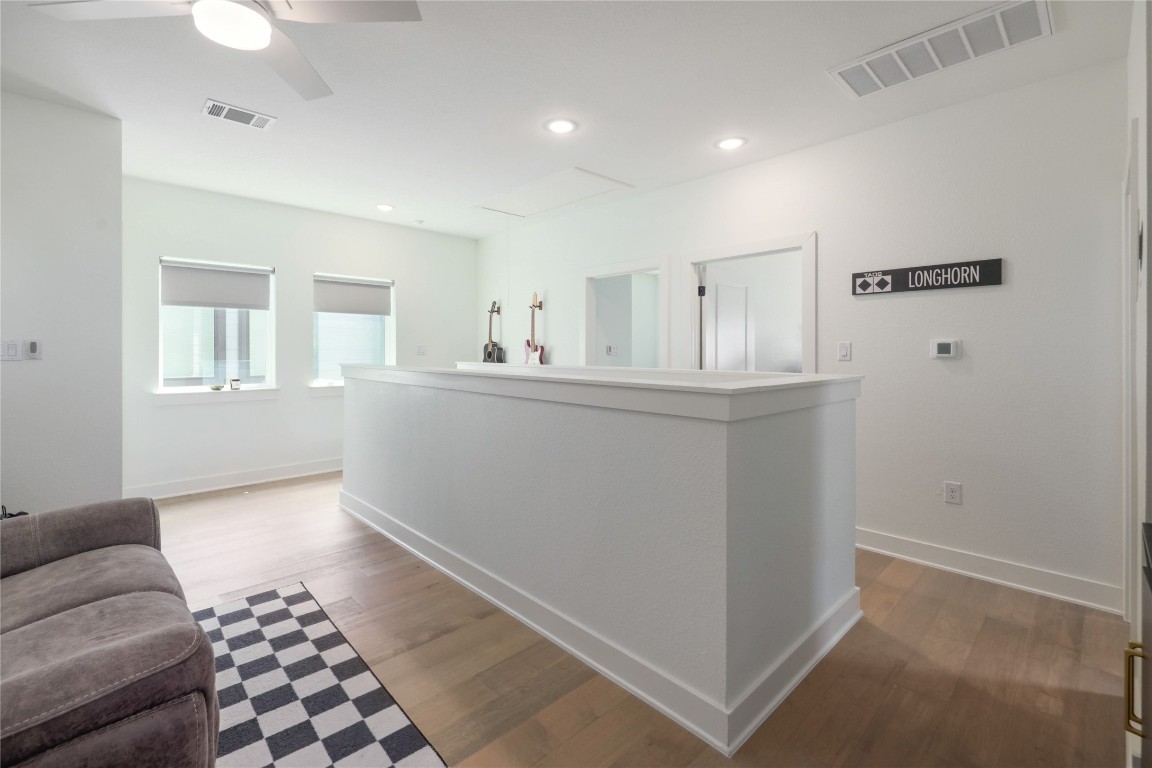 5820 Sutherlin Road, Unit 17 Austin, TX 78723 - Photo 8 of 15 a view of a livingroom with furniture and cabinet