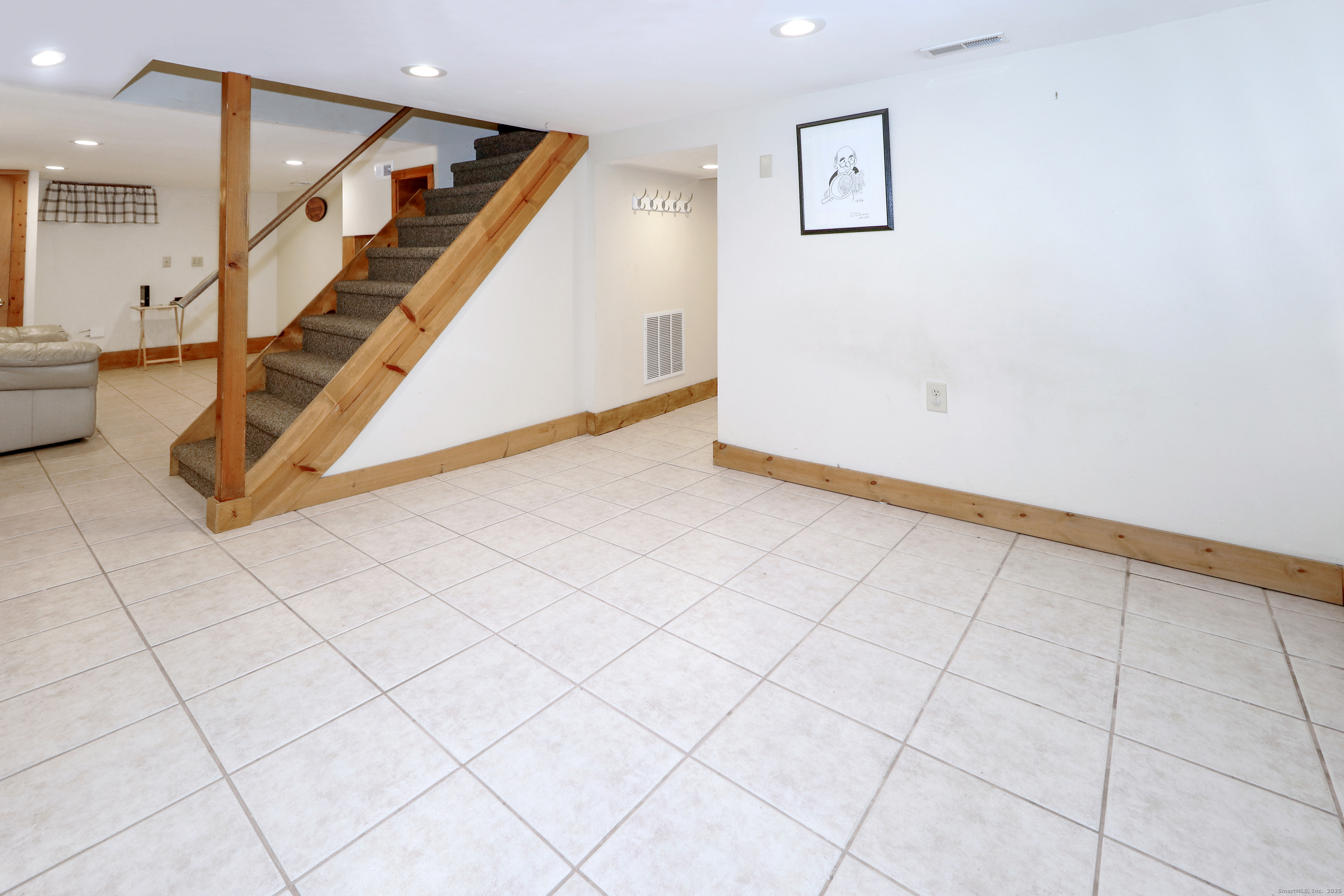 28 Stillson Place Fairfield, CT 06824 - Photo 22 of 28 a view of an entryway with stairs