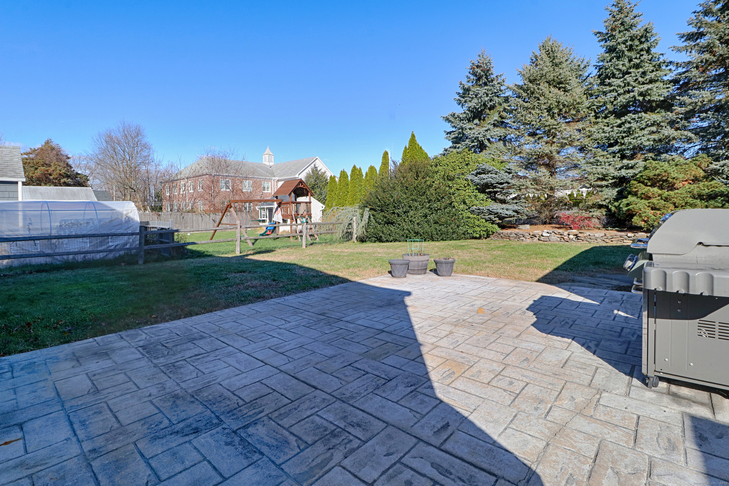 28 Stillson Place Fairfield, CT 06824 - Photo 26 of 28 a view of a yard with an outdoor space