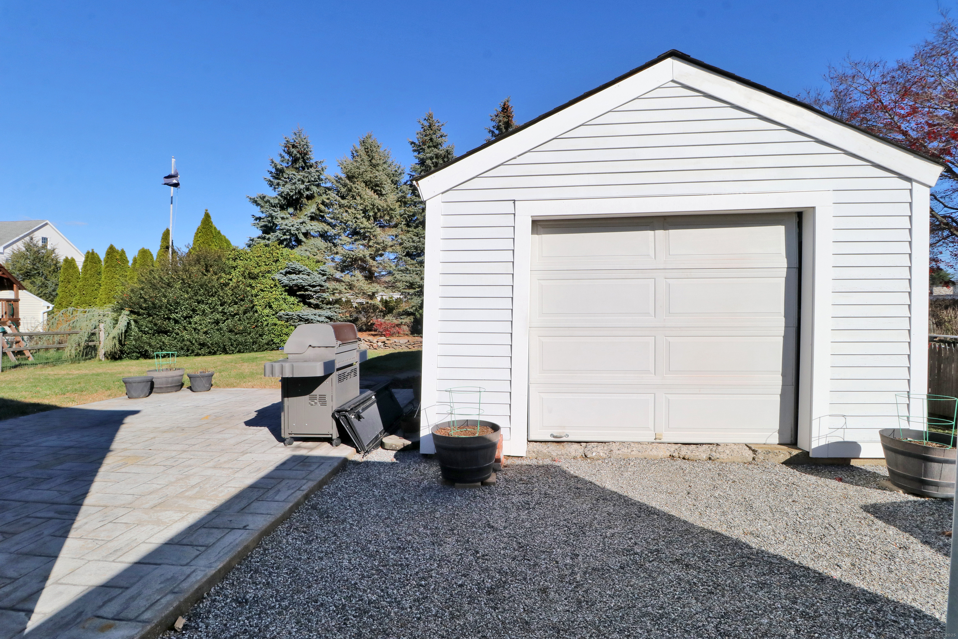 28 Stillson Place Fairfield, CT 06824 - Photo 3 of 28 a view of a house with a backyard
