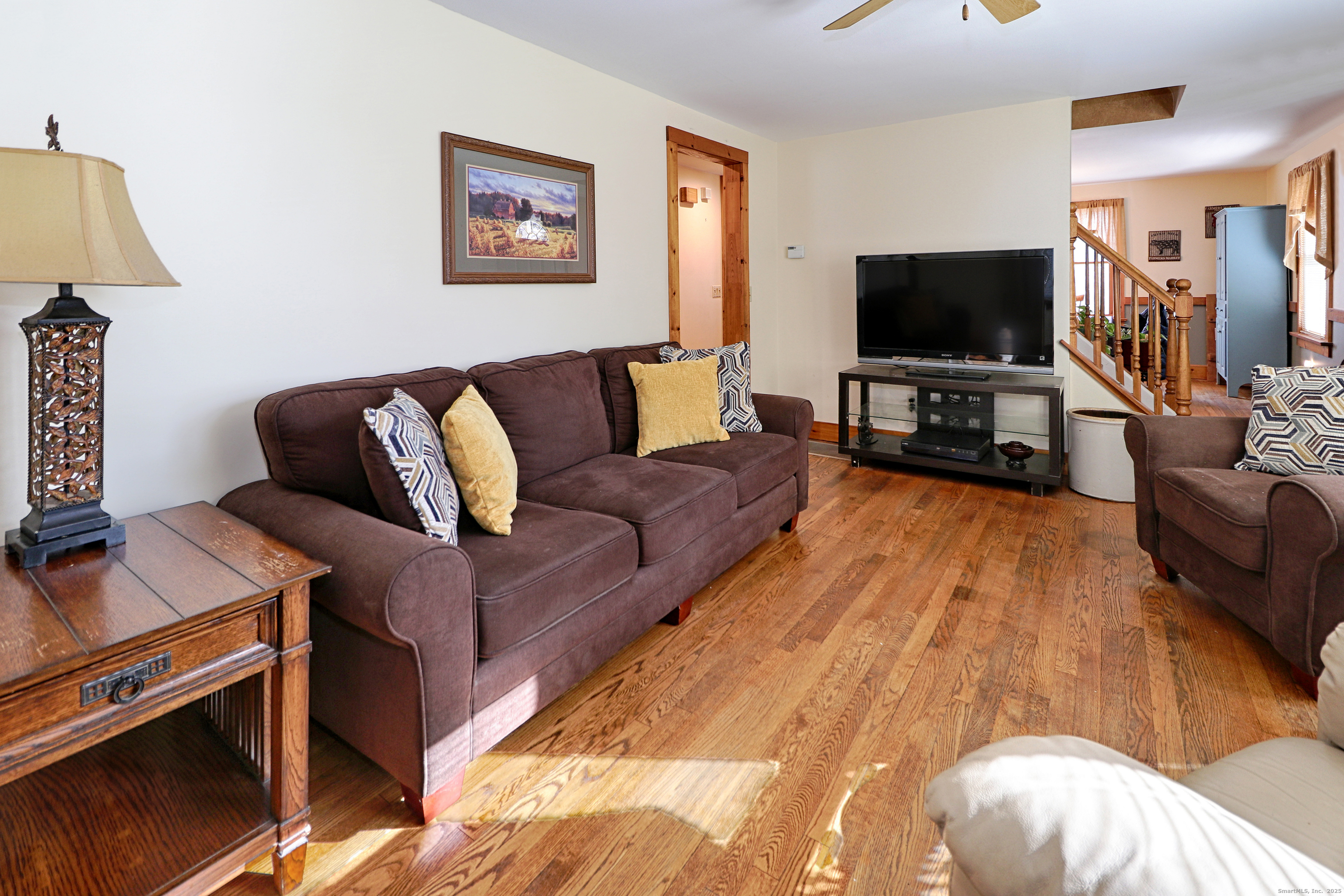 28 Stillson Place Fairfield, CT 06824 - Photo 6 of 28 a living room with furniture and a flat screen tv
