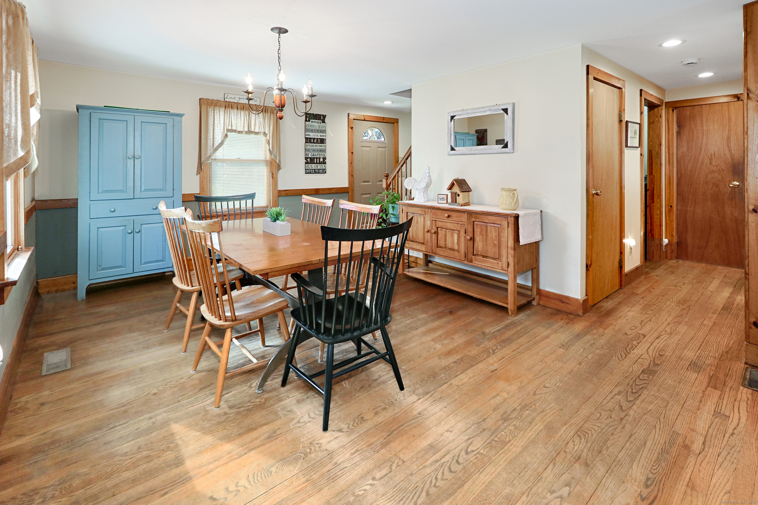 28 Stillson Place Fairfield, CT 06824 - Photo 8 of 28 a view of a dining room with furniture window and wooden floor