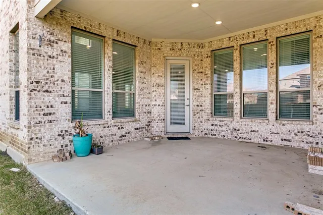 a view of spacious bathroom with large windows