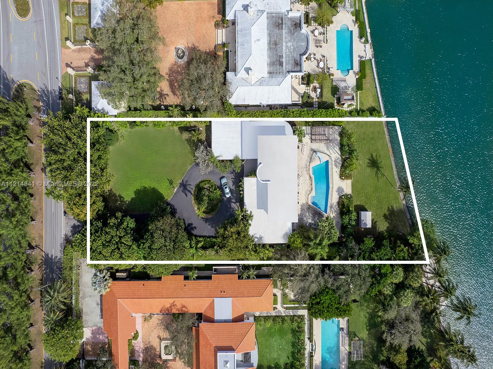 4525 Pine Tree Drive Miami Beach, FL 33140 - Photo 12 of 19 an aerial view of house with a swimming pool