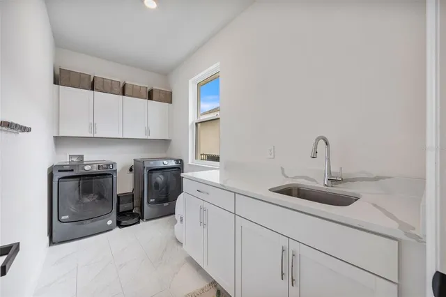 a bathroom with a sink toilet and a mirror