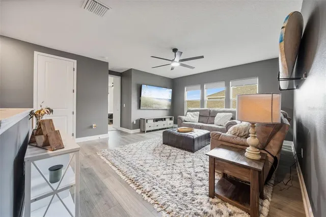 an aerial view of a house with a lake view