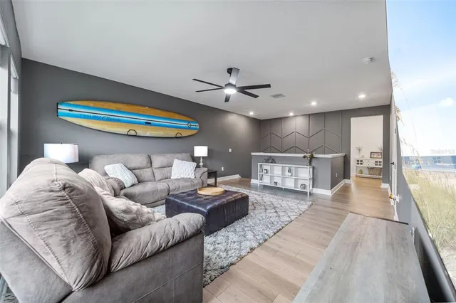 an aerial view of a house with a lake view