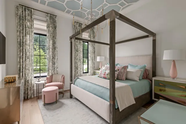 a bedroom with furniture and a window