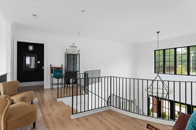a living room with a fireplace furniture and a flat screen tv