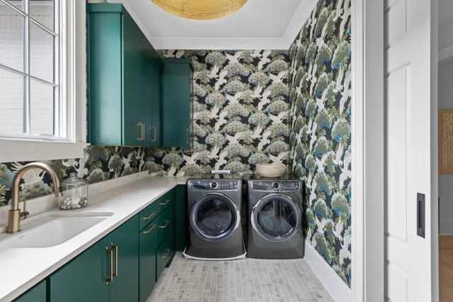 a bathroom with a toilet a sink and a mirror