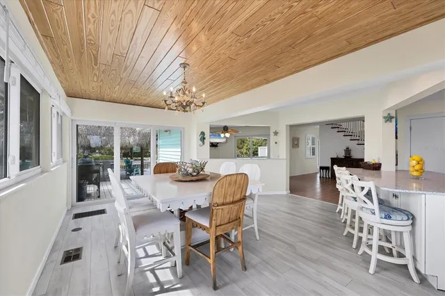 a bedroom with two beds and window