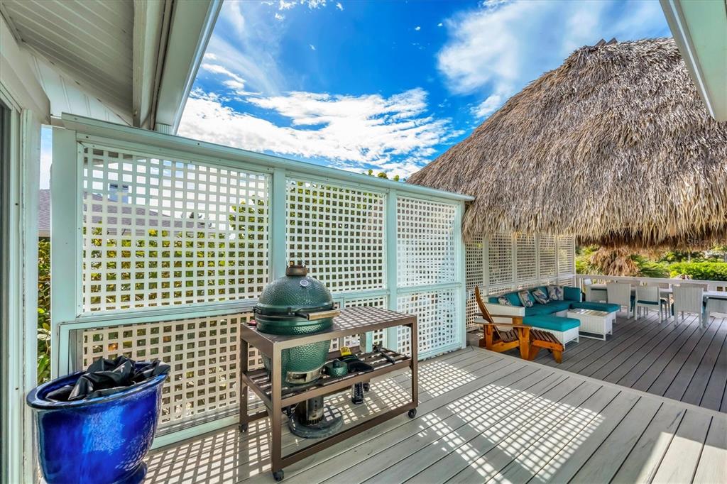 3547 Gasparilla Road Boca Grande, FL 33921 - Photo 37 of 43 a view of a balcony with chairs