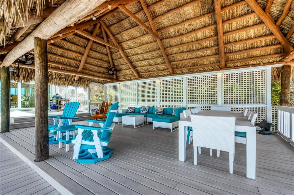 3547 Gasparilla Road Boca Grande, FL 33921 - Photo 39 of 43 a view of a chairs and table in a patio