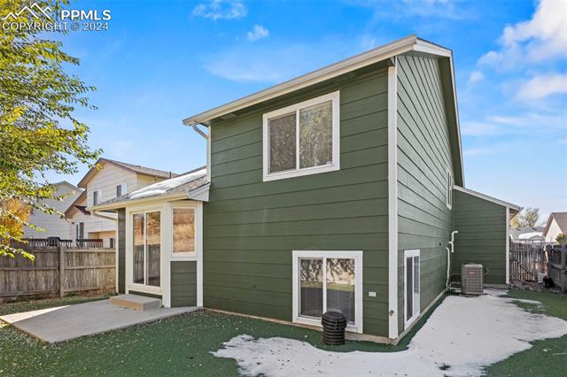 4763 Brant Road Colorado Springs, CO 80911 - Photo 26 of 26 Back of house featuring cooling unit and a patio