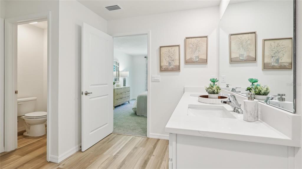10787 Tucker Road Weeki Wachee, FL 34613 - Photo 15 of 22 a bathroom with a sink a toilet and shower