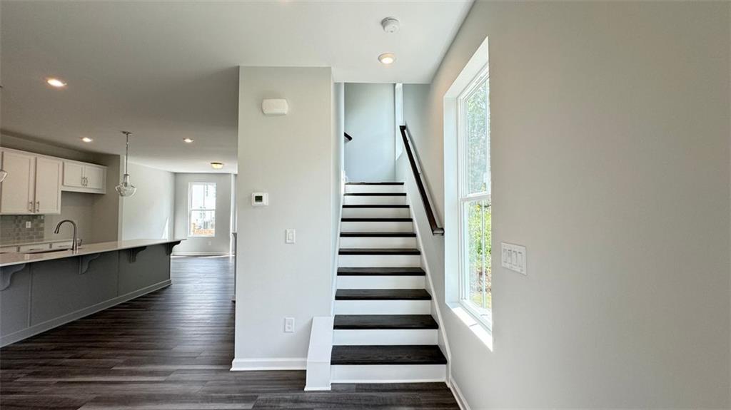 1479 Creekside Circle Northwest Atlanta, GA 30318 - Photo 17 of 42 a view of entryway and hall with wooden floor