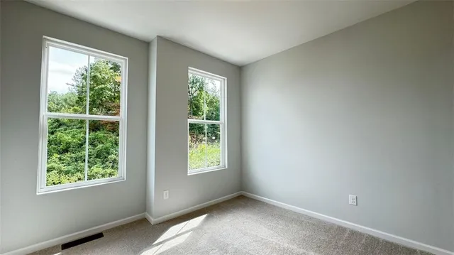 an empty room with windows