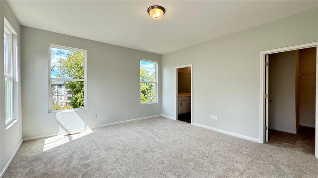 1479 Creekside Circle Northwest Atlanta, GA 30318 - Photo 22 of 42 a view of an empty room with a window