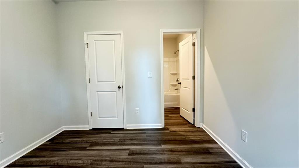 1479 Creekside Circle Northwest Atlanta, GA 30318 - Photo 29 of 42 a view of a hallway with wooden floor