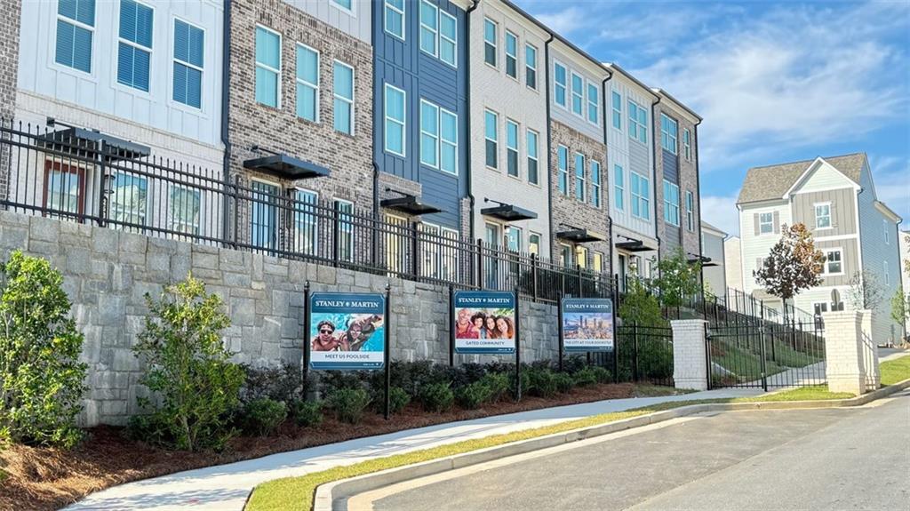 1479 Creekside Circle Northwest Atlanta, GA 30318 - Photo 39 of 42 a front view of a multi story building