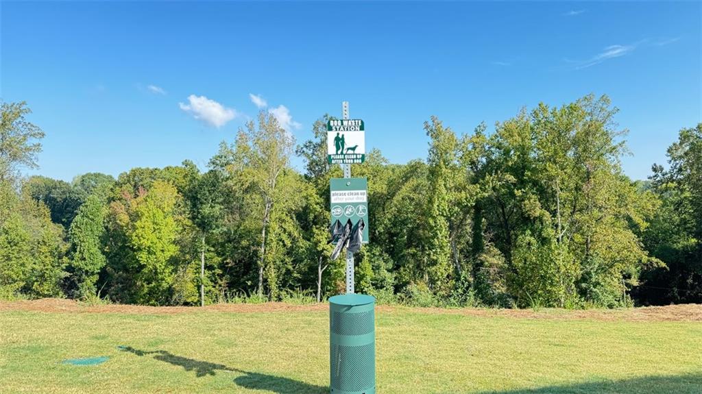 1479 Creekside Circle Northwest Atlanta, GA 30318 - Photo 40 of 42 a view of a yard with a house in the background