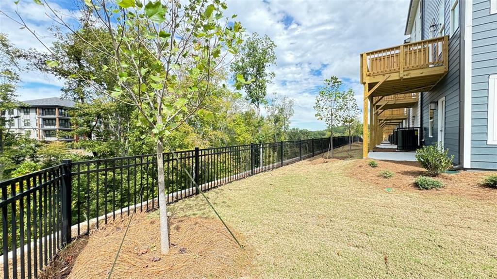 1479 Creekside Circle Northwest Atlanta, GA 30318 - Photo 4 of 42 a view of a house with backyard